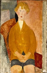 Niño en pantalones cortos